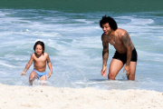 Real Madrid player Marcelo hits the beach with his family in Rio