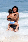 Real Madrid player Marcelo hits the beach with his family in Rio