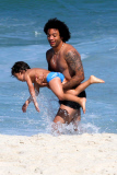 Real Madrid player Marcelo hits the beach with his family in Rio