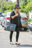 *EXCLUSIVE* Fergie and Josh Duhamel stop by their new mansion