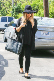 *EXCLUSIVE* Fergie and Josh Duhamel stop by their new mansion