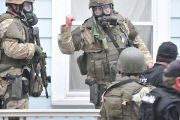 Images taken by Massachusetts State Police photographer Sgt. Sean Murphy of Boston Bomber manhunt, Boston, America - 19 Apr 2013