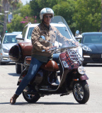 Exclusive... Tom Hanks Buys A New Vespa 