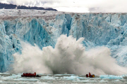 Visitors witness large chunk falling from Monaco Glacier, Spitsbergen - 24 Jul 2013