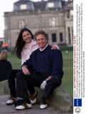 1999 Dunhill Cup Michael Douglas And Catherine Zeta Jones Catherine Zeta Jones And Michael Douglas Sit On The Swilken Brdge On The 18th Fairway At St Andrews Married November 19 2000