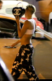 Miley Cyrus leaves High Voltage Tattoo