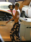 Miley Cyrus leaves High Voltage Tattoo
