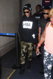 Rihanna marches through LAX after bodyguard goes ballistic on photographer