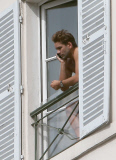 ** NO WEB** Romain Dauriac, boyfriend of Scarlett Johansson at the window of his home in Paris