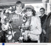 Motor Racing Driver - James Hunt 1977 Mrs. Pat Harmsworth Presents The Trophy To James Hunt Who Won The Marlboro-daily Mail Race At Brand's Hatch For The Second Successive Year....