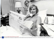 Motor Racing Driver James Hunt 1980 James Hunt In Hospital James Hunt In His Private Hospital Room Sorting Through The Business Section Of The Financial Times ... And For Relaxation A Copy Of Playboy....he Is Recovering From A Torn Ligament
