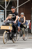 Naomi Watts and Liev Schreiber bike the kids to school