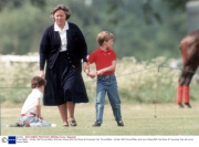 Prince William - 20 May 1990 Princes William And Harry Playing With Polo Sticks At Cirencester Park.