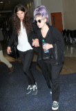 Kelly Osbourne with fiancee Matthew Mosshart at LAX