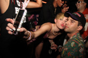 Miley Cyrus leaves little to the imagination at "Bangerz" Album Release Party