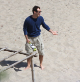 Jude Law and his children hit the beach