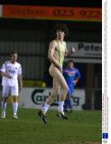 Dorchester Town player-manager Ashley Vickers sent off for tackling pitch invader in Borat mankini during football match at Havant and Waterlooville, Hampshire, Britain - 07 Mar 2011