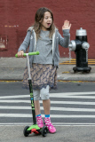Hugh Jackman takes his daughter Ava to school on their scooters