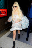 Lady Gaga at LAX holding a weird claw