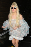 Lady Gaga at LAX holding a weird claw