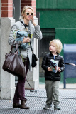 Naomi Watts hussels her sons off to school