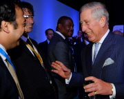 Britain's Prince Charles, Prince of Wales (R) speaks with guests during a reception and gala dinner at the end of the opening day of the 9th World Islamic Economic Forum in London on October 29, 2013. The Prince of Wales addressed visiting dignatories and