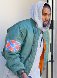 EXCLUSIVE: Kanye West shows off his Confederate flag Jacket after boxing