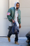 EXCLUSIVE: Kanye West shows off his Confederate flag Jacket after boxing