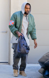 EXCLUSIVE: Kanye West shows off his Confederate flag Jacket after boxing