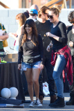 Sisters Kylie Jenner and Kourtney Kardashian are all smiles over their Yard Sale