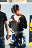 Sisters Kylie Jenner and Kourtney Kardashian are all smiles over their Yard Sale