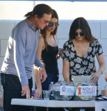 The Kardashian/Jenner girls helping out