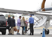 Charlie Sheen and Denise Richards boarding on the Private Jet with their children