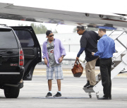 Charlie Sheen and Denise Richards boarding on the Private Jet with their children