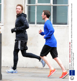 Chris Martin Running on Regent St, London, Britain - 06 Mar 2013