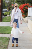 January Jones and Xander in matching white