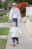 January Jones and Xander in matching white