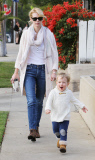 January Jones and Xander in matching white