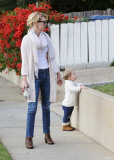 January Jones and Xander in matching white