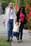 January Jones and Xander in matching white