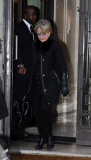 Celine Dion and her husband leaving their Parisian hotel