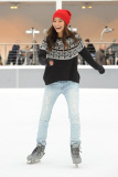Jamie Chung gets in the holiday spirit wearing American Eagle #AEOStyle While Ice Skating