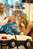 Hilary Duff entertains Luca while getting his Haircut