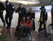 Johnny Hallyday and Laetitia arrived with their children, Jade and Joy, at Roissy airport in Paris