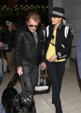 Johnny Hallyday and Laetitia arrived with their children, Jade and Joy, at Roissy airport in Paris