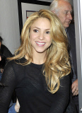 Shakira is gorgeous as she arrives for a departing flight at LAX
