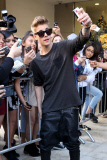 Justin Bieber takes pictures with his Fans