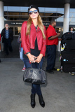 Paris Hilton strikes her best pose at LAX