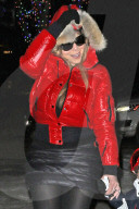 Mariah Carey and Nick Cannon keep a tight hold of the twins as they take a snowy stroll