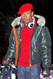 Mariah Carey and Nick Cannon keep a tight hold of the twins as they take a snowy stroll